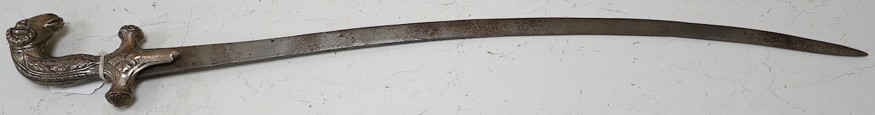 A decorative Indian sword, Shamshir hilt of embossed silver plated copper with a rams head pommel, blade 73.5cm. Condition - good